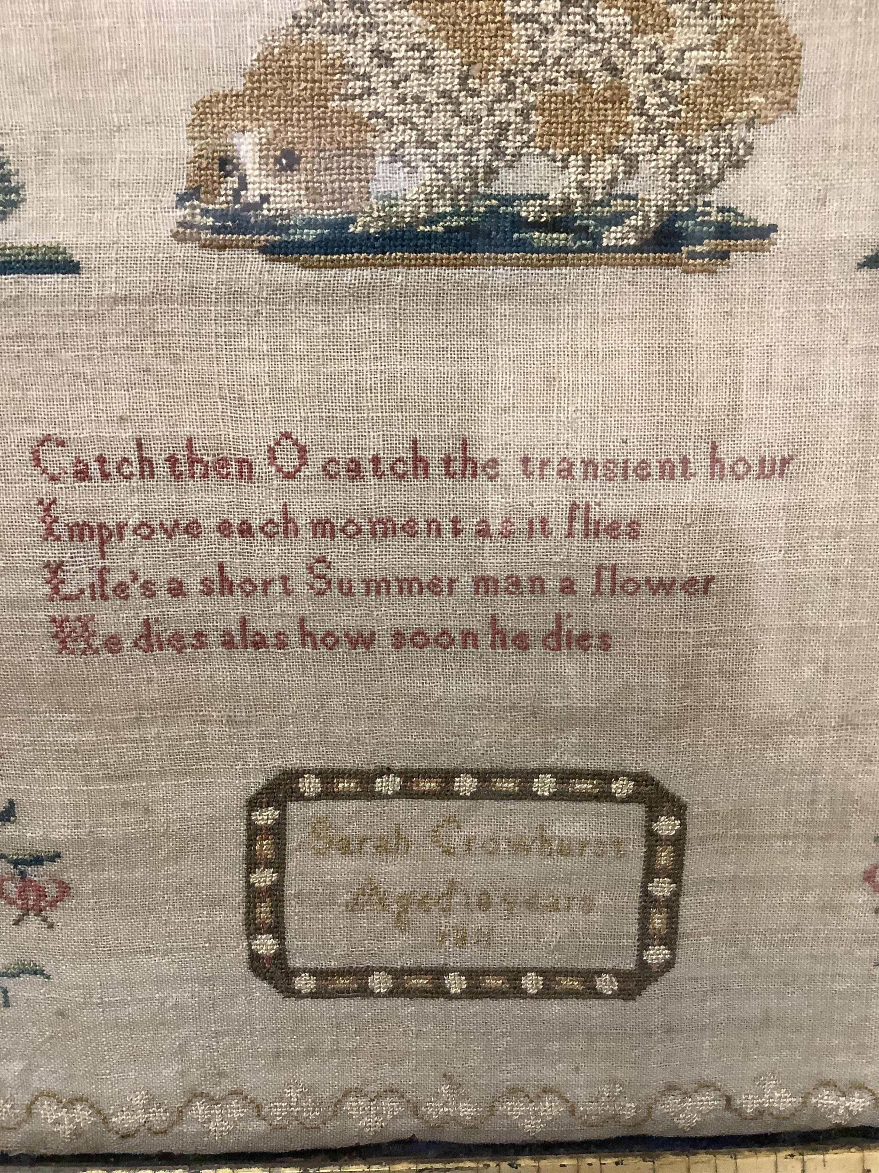 An early 19th century framed sampler by Sarah Crowhurst aged 10 years, dated 1811. Very finely embroidered, on fine linen, with a line of alphabet, then a religious verse and a large central spaniel motif between stylist